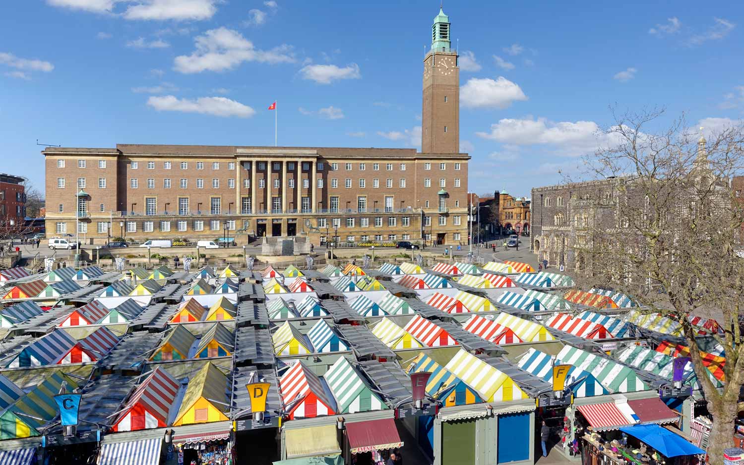 Norwich Market’s striped stall roofs, with City Hall behind